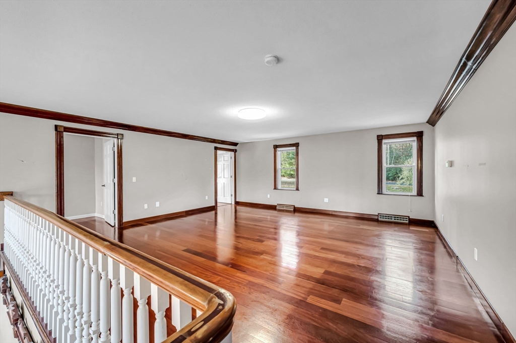 199 Chapin Road Hampden, MA 01036 - Photo 30 of 42 a view of an empty room with window and wooden floor