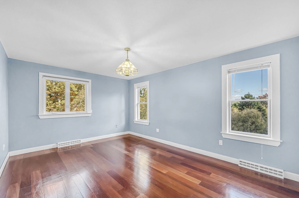 199 Chapin Road Hampden, MA 01036 - Photo 32 of 42 a view of an empty room with wooden floor and a window