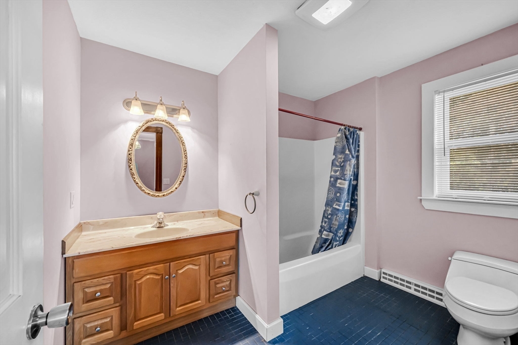 199 Chapin Road Hampden, MA 01036 - Photo 33 of 42 a bathroom with a double vanity sink mirror and toilet