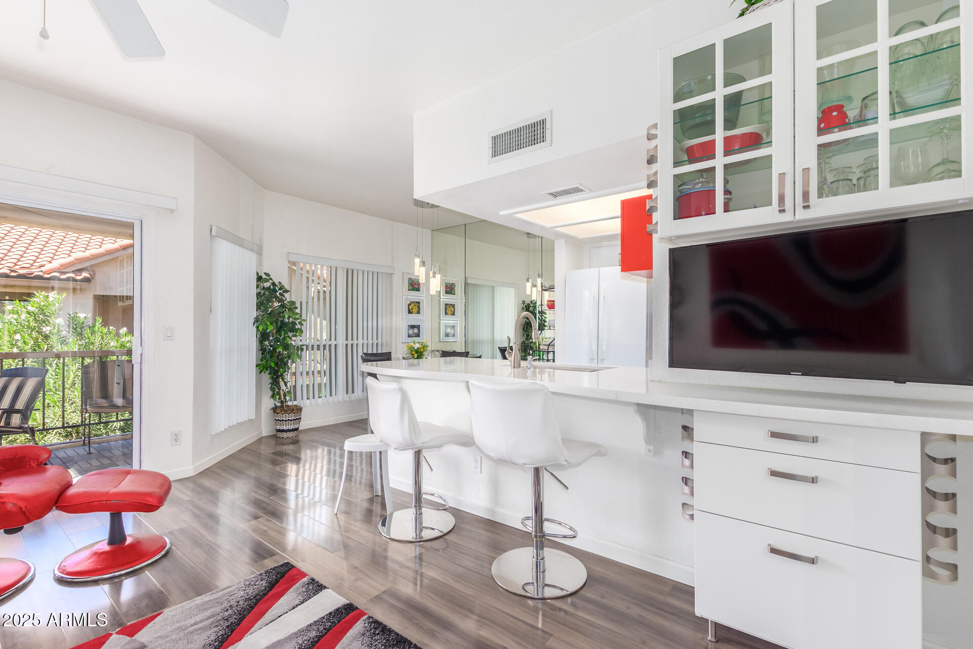 9711 East Mountain View Road, Unit 2524 Scottsdale, AZ 85258 - Photo 14 of 48 a living room with fireplace furniture and a potted plant
