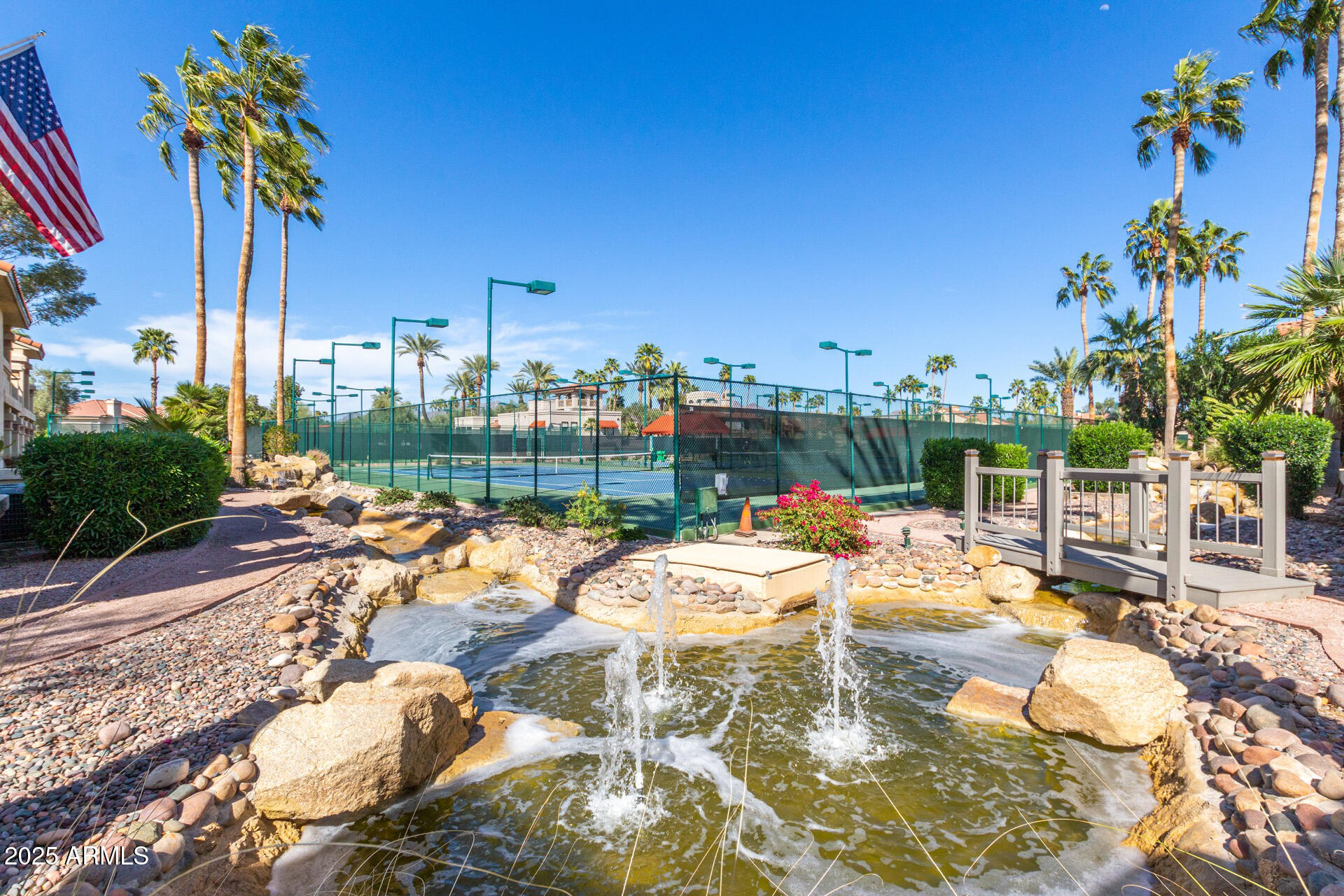 9711 East Mountain View Road, Unit 2524 Scottsdale, AZ 85258 - Photo 45 of 48 a view of a swimming pool with a lounge chairs