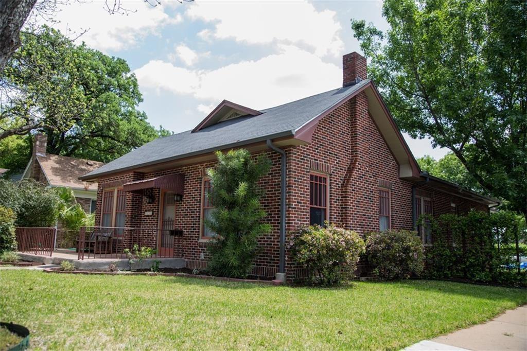 1115 West 22 1/2 Street Austin, TX 78705 - Photo 1 of 33 a view of a house with backyard and garden