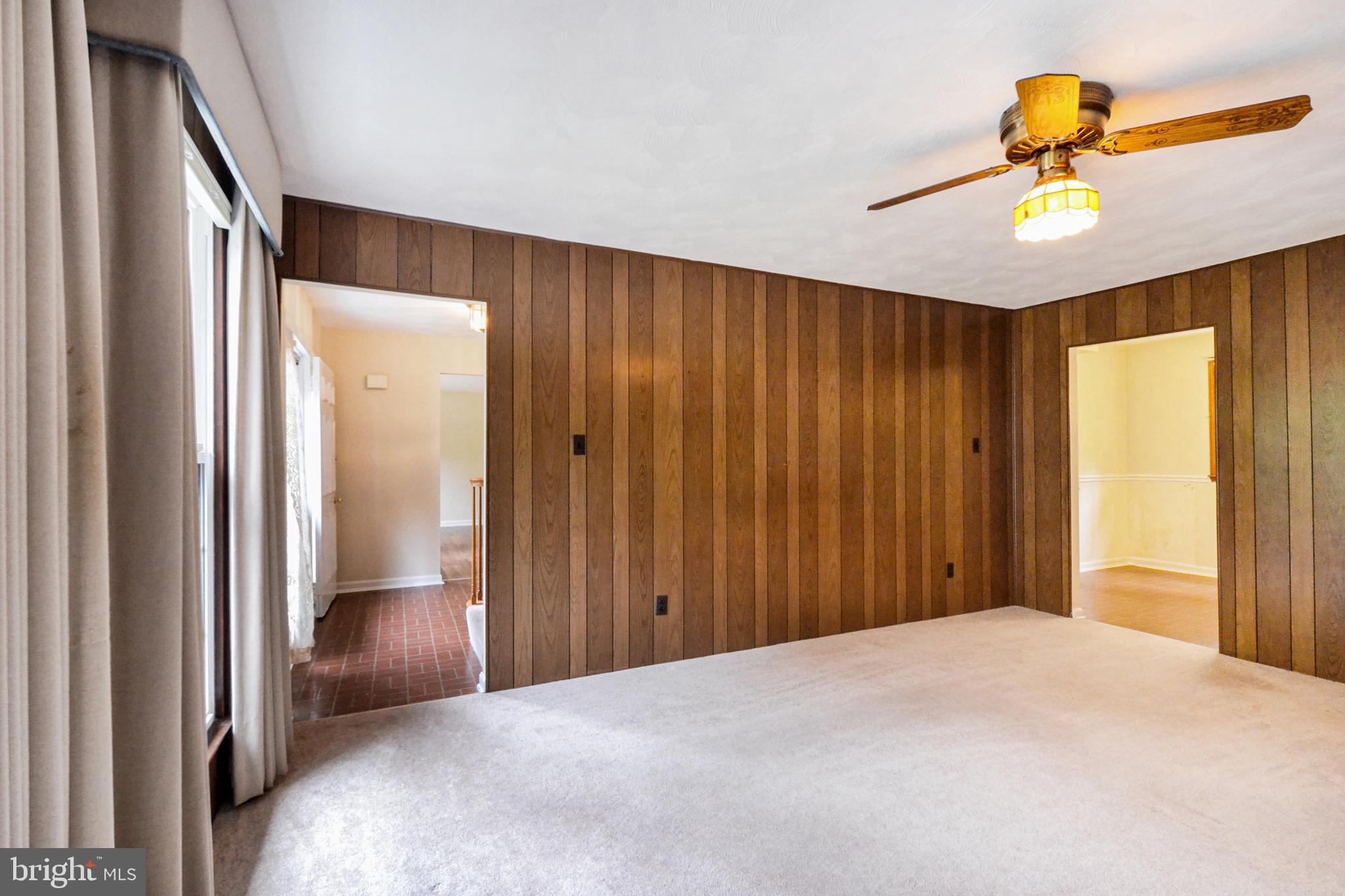 Family Room with wood-burning fireplace.