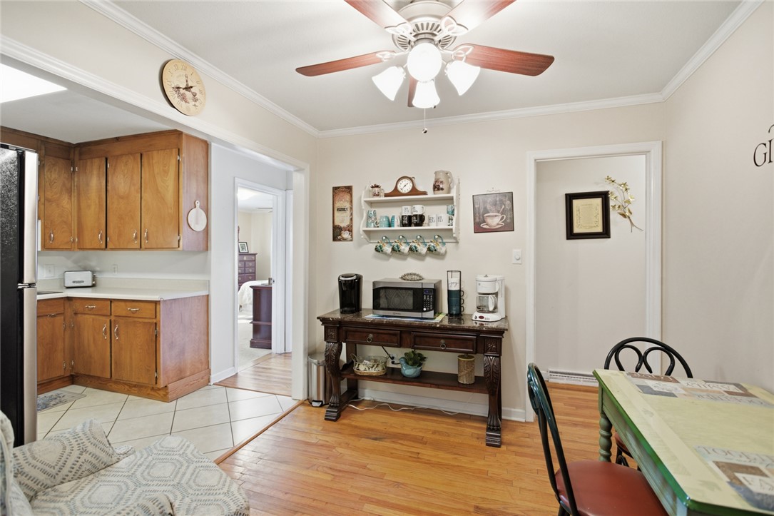 108 Hodge Street Abbeville, SC 29620 - Photo 10 of 39 A versatile space where culinary tasks meet casual dining, offering seamless flow.