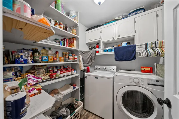 a storage room with washer and dryer