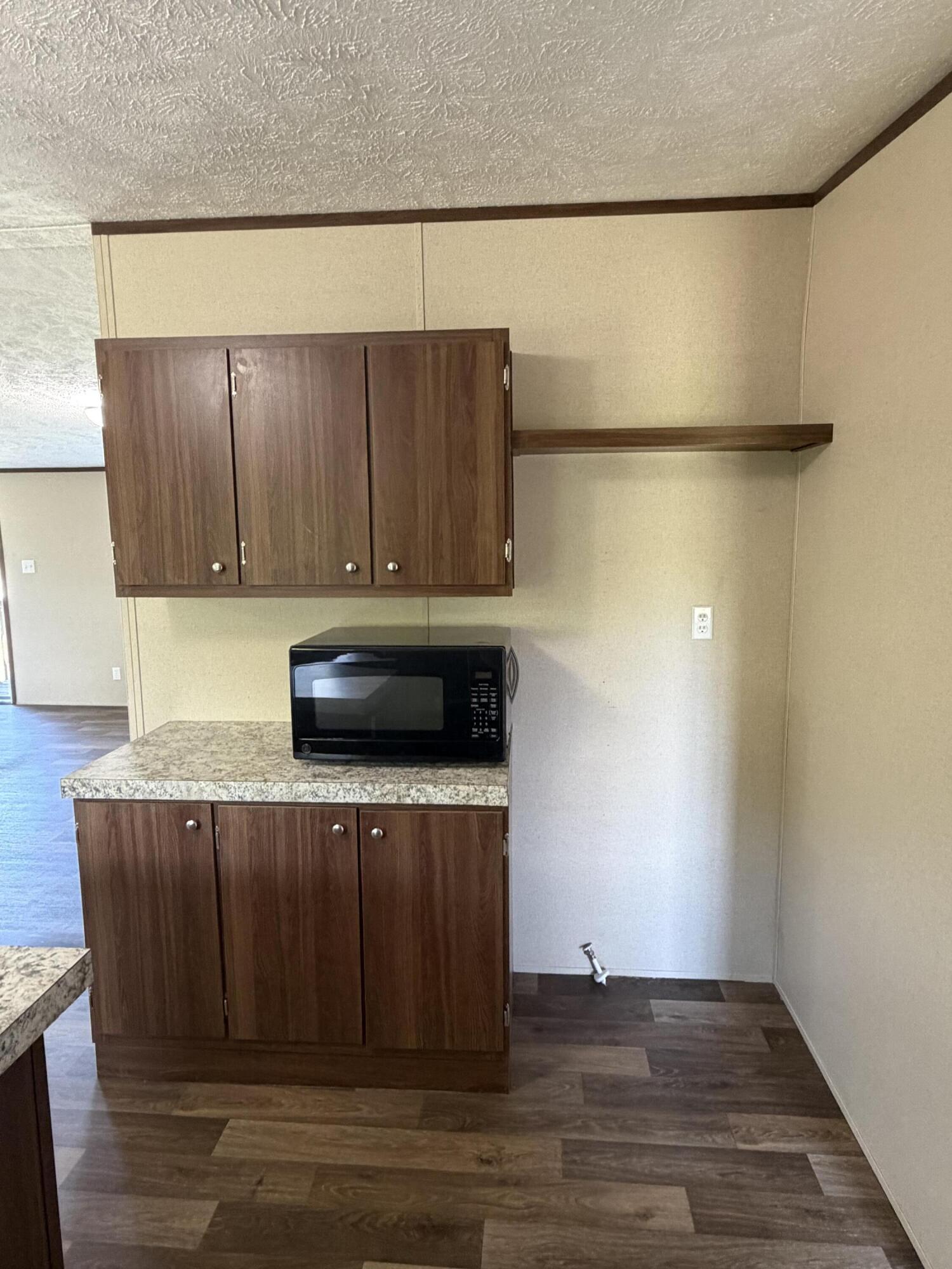 1644 Gap Road Chatham, VA 24531 - Photo 6 of 15 a kitchen with a wooden floor and a sink