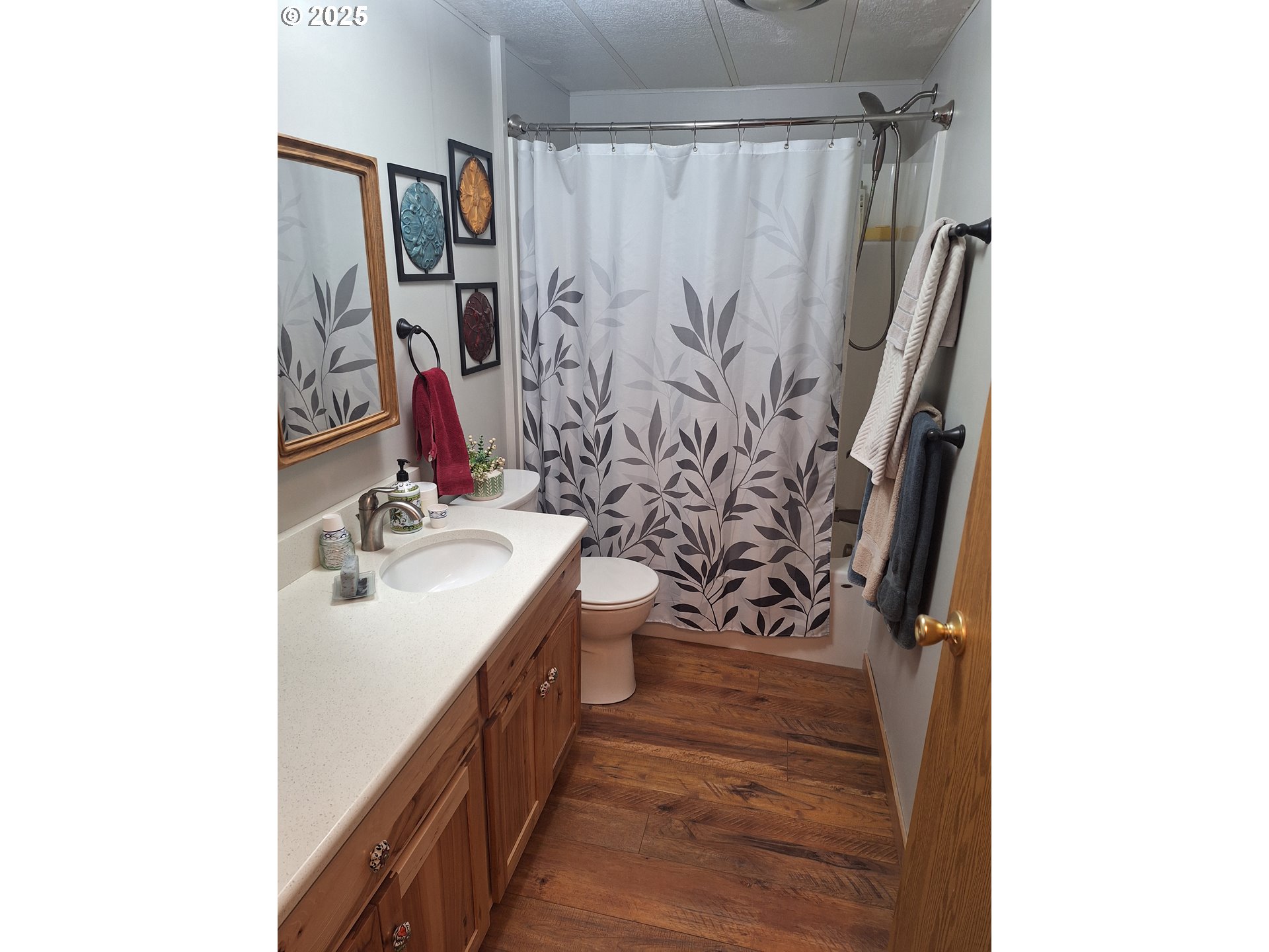 64929 Hurricane Creek Road Enterprise, OR 97828 - Photo 11 of 22 a bathroom with a sink and a mirror