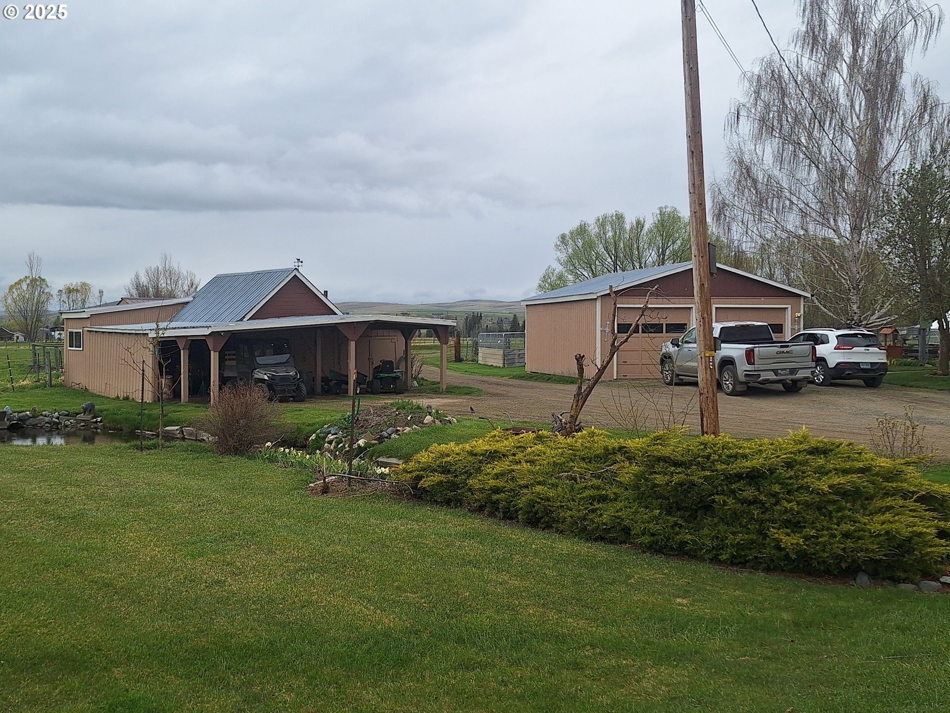 64929 Hurricane Creek Road Enterprise, OR 97828 - Photo 13 of 22 a front view of a house with a yard
