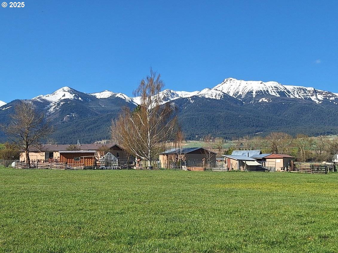 64929 Hurricane Creek Road Enterprise, OR 97828 - Photo 18 of 22 a view of a house with a big yard