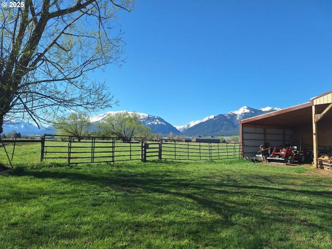 64929 Hurricane Creek Road Enterprise, OR 97828 - Photo 21 of 22 a view of a house with a yard