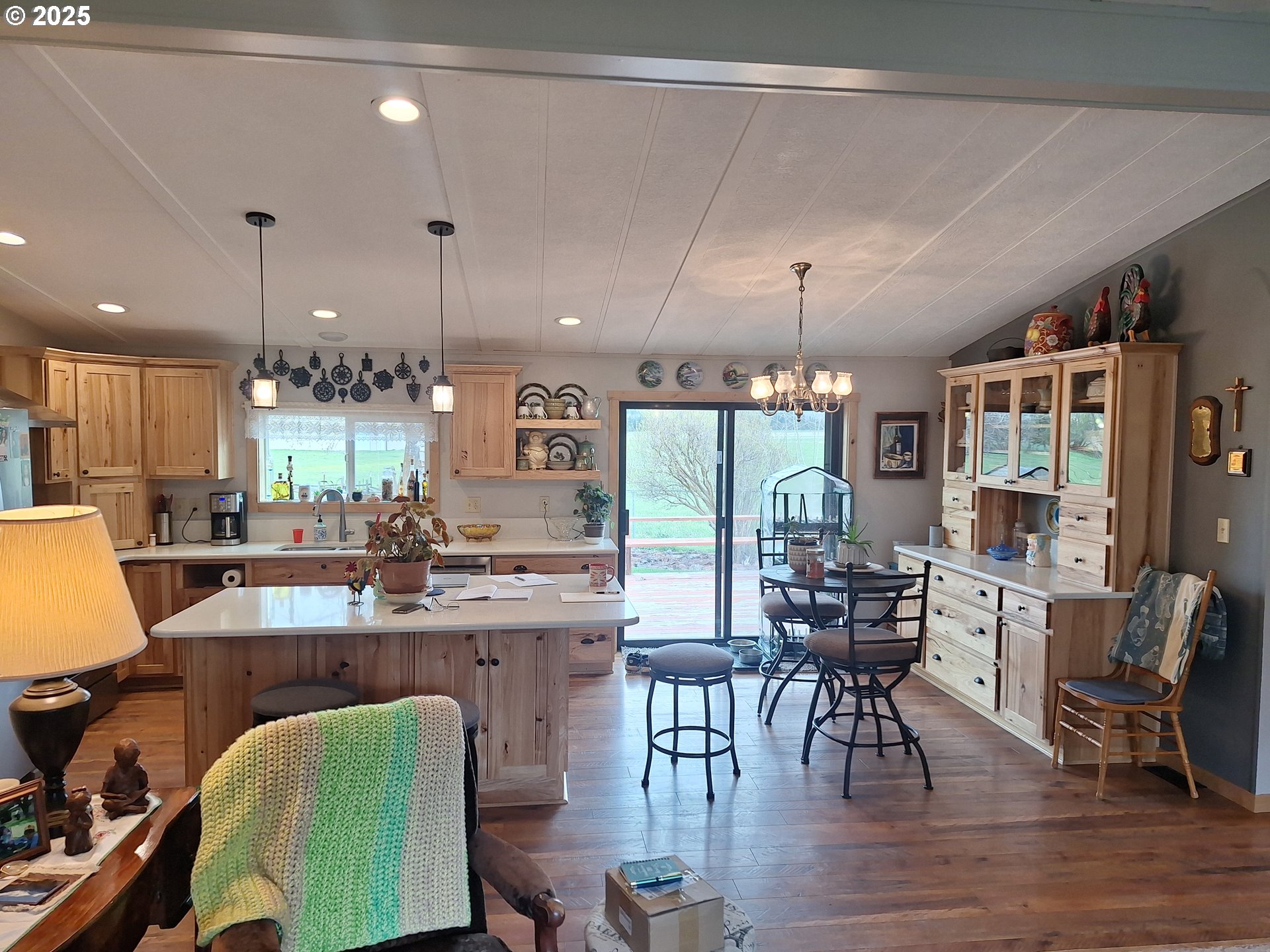 64929 Hurricane Creek Road Enterprise, OR 97828 - Photo 6 of 22 a view of a dining room with furniture window and wooden floor