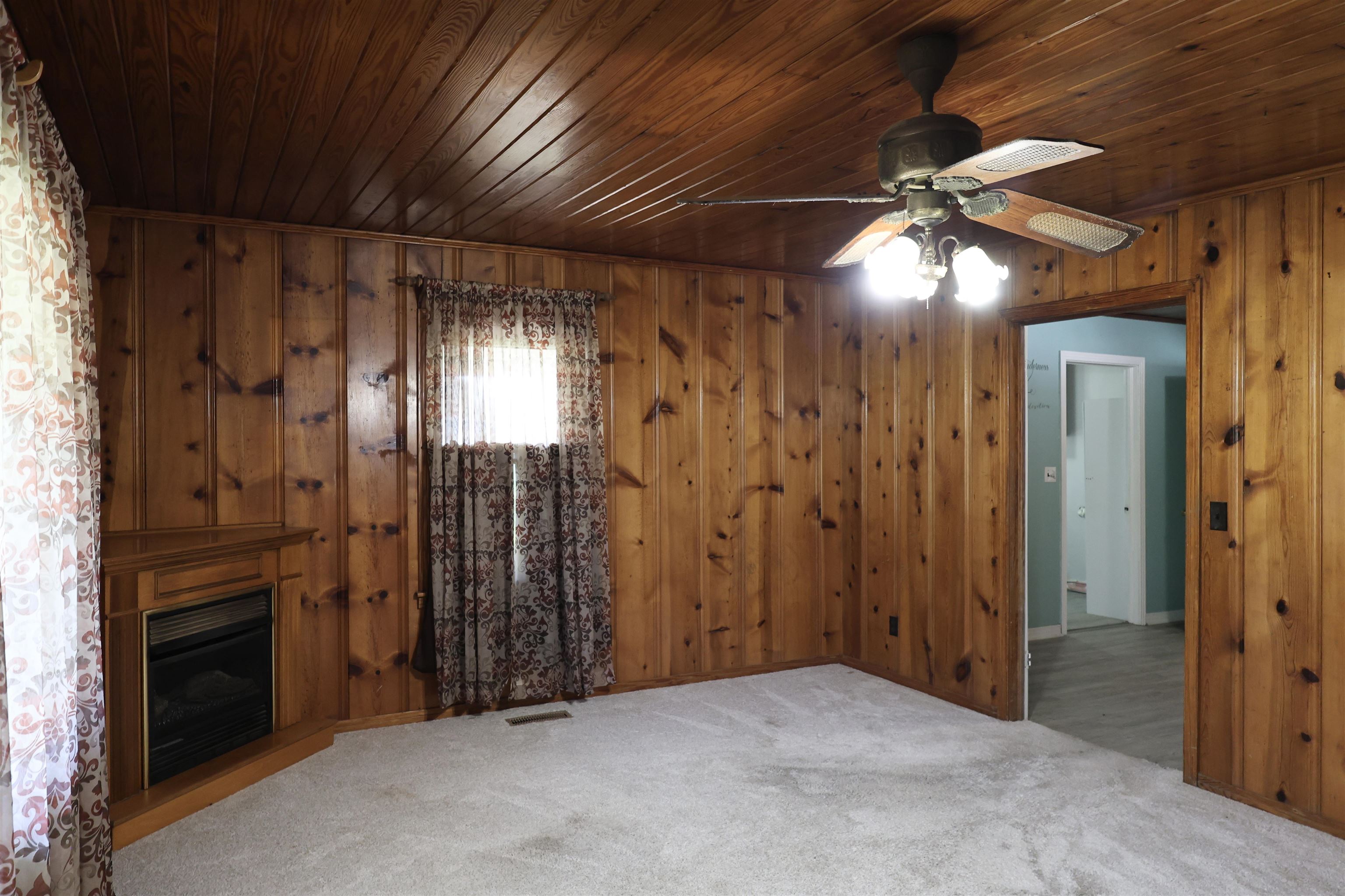 123 North Magnolia Street Adamsville, TN 38310 - Photo 17 of 25 an empty room with fan walk in closet