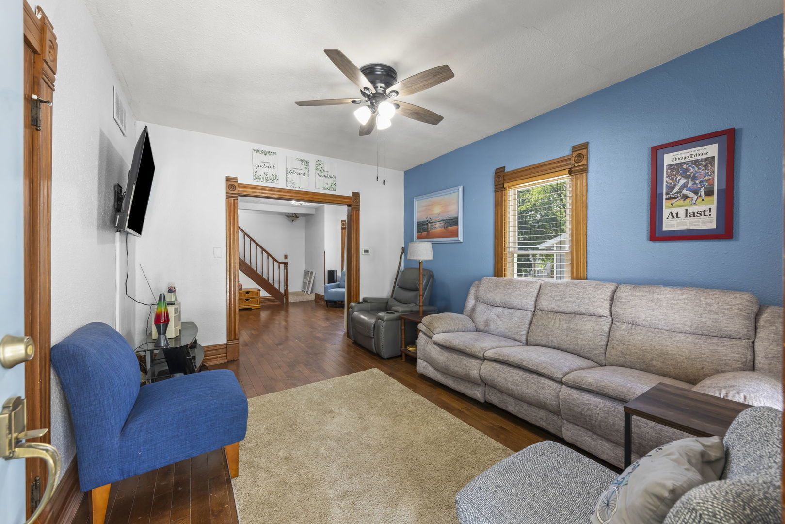 520 South Jefferson Street Lockport, IL 60441 - Photo 3 of 31 a living room with furniture and a flat screen tv