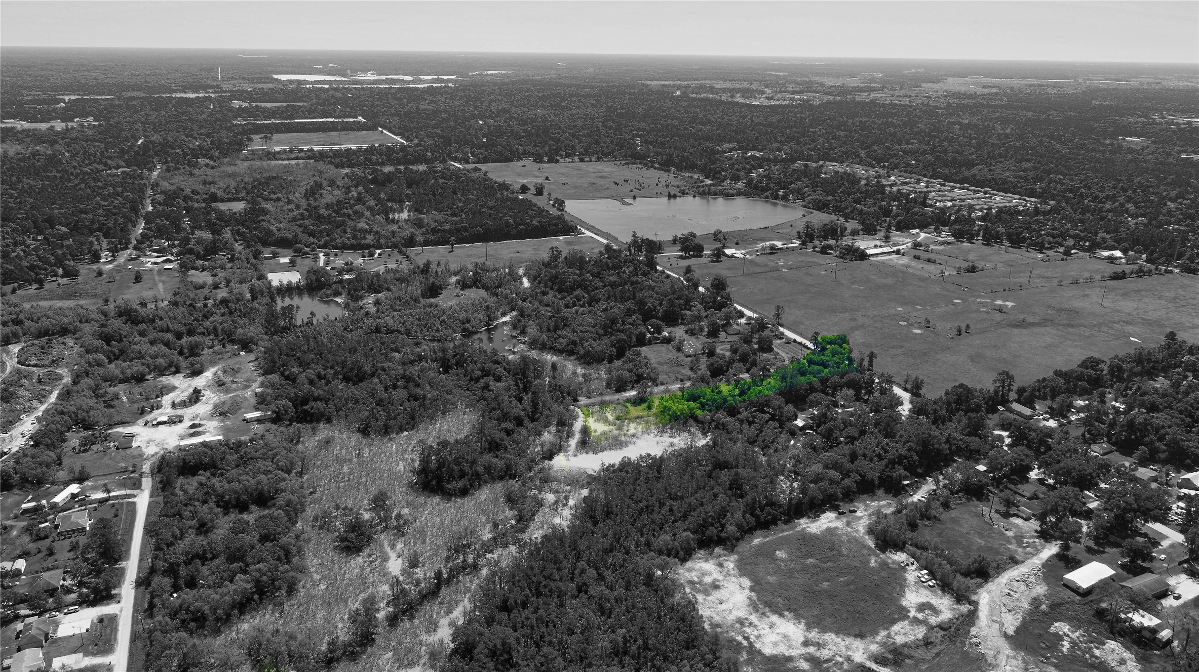 0 Sleepy Hollow Road Conroe, TX 77385 - Photo 6 of 7 a view of a road with mountains in the background