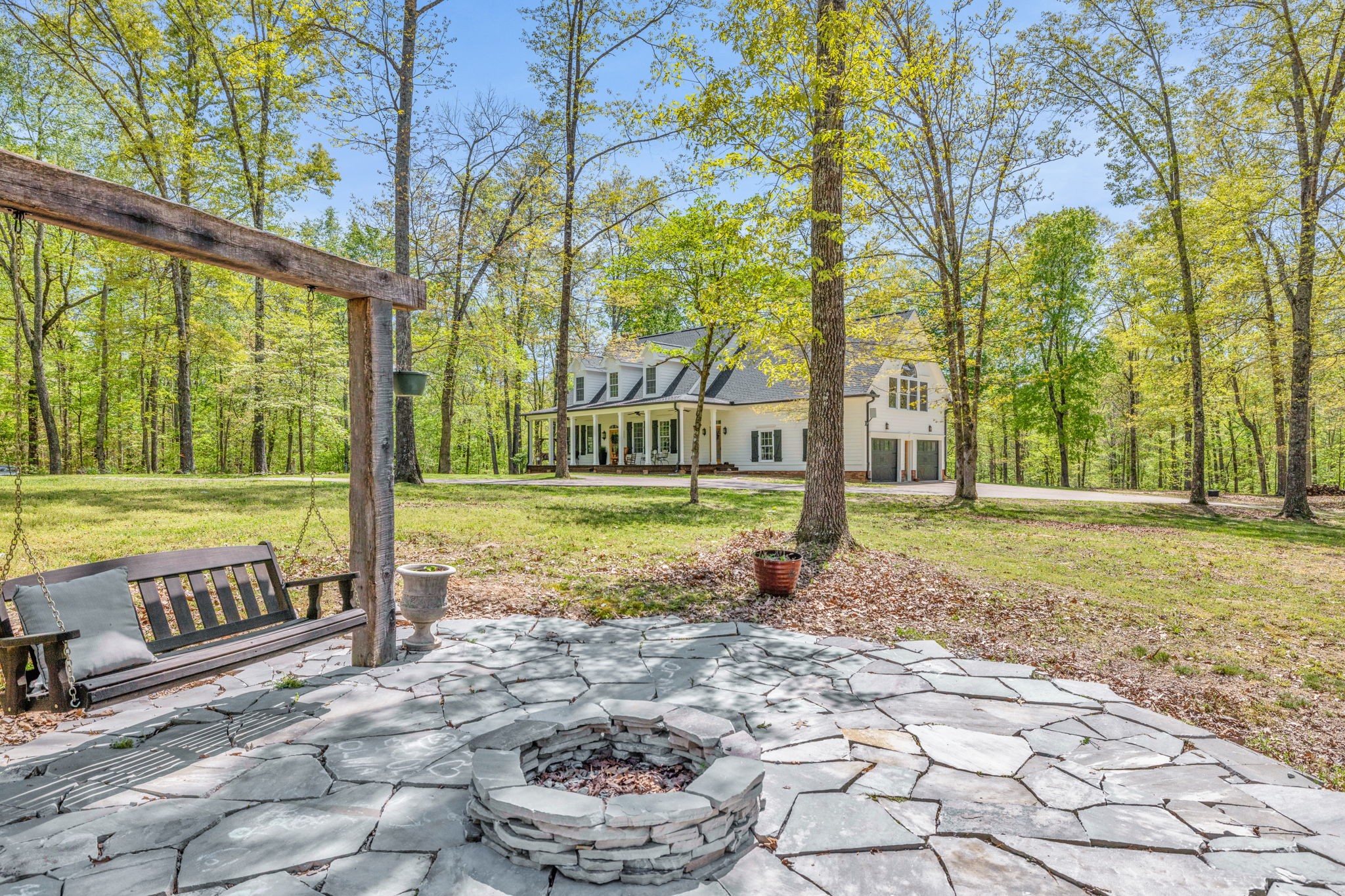 7136 New Hope Road Fairview, TN 37062 - Photo 3 of 70 a view of a house with backyard and trees
