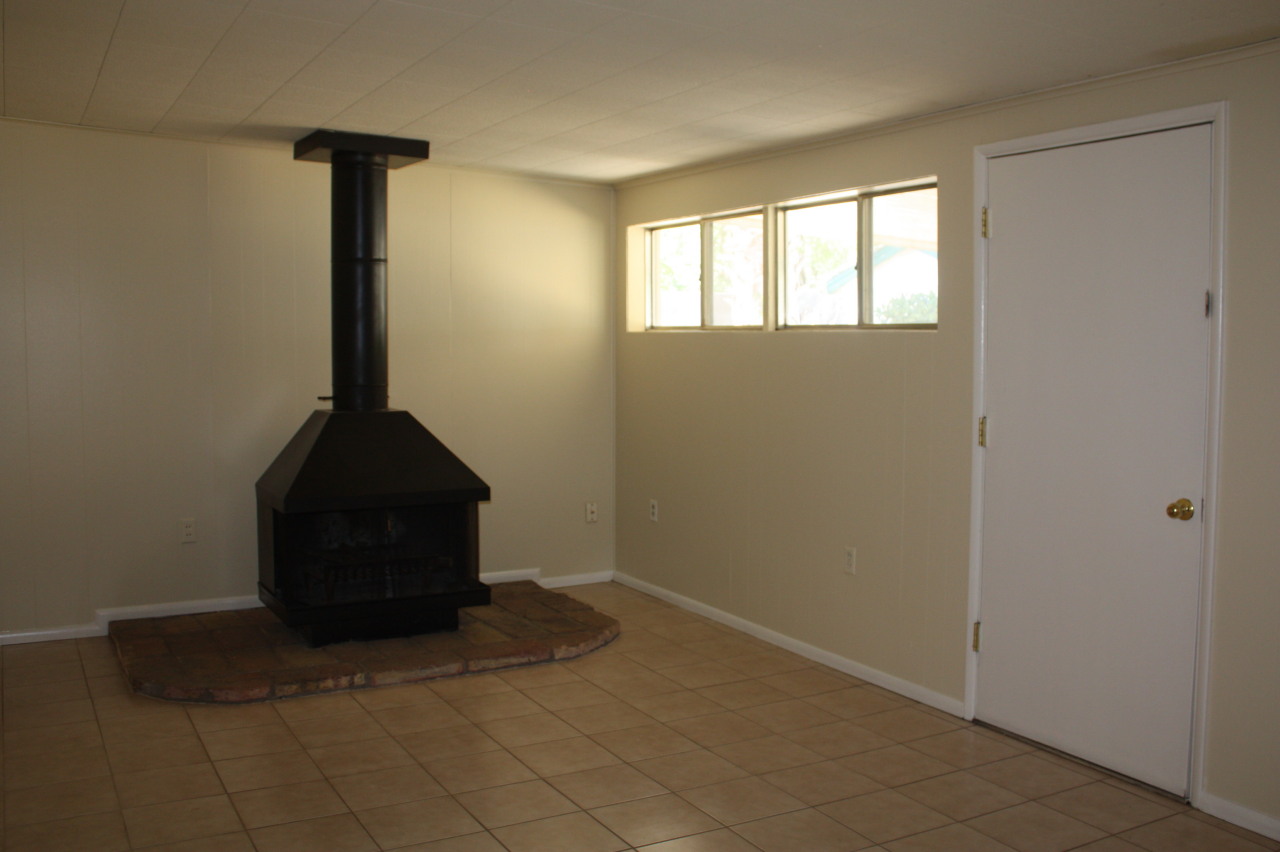 4222 East Piccadilly Road Phoenix, AZ 85018 - Photo 4 of 9 Family Room w/ freestanding fireplace