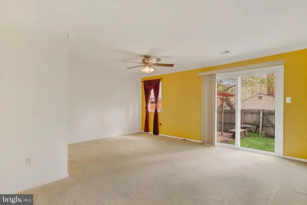a view of a room with a large window