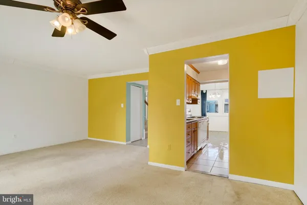a view of a hallway with a bathroom
