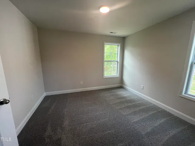 a view of a yard with a trees