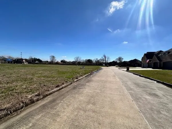 a view of a lake with a city