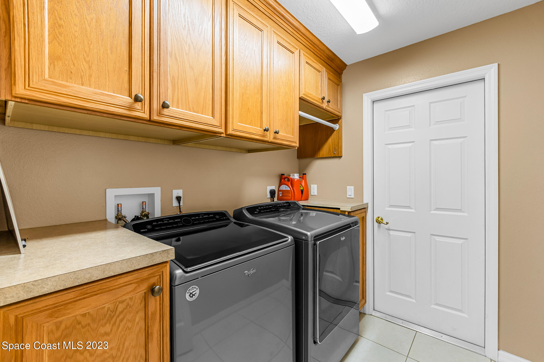 1201 Daton Road Southwest Palm Bay, FL 32908 - Photo 40 of 46 a utility room with dryer and washer