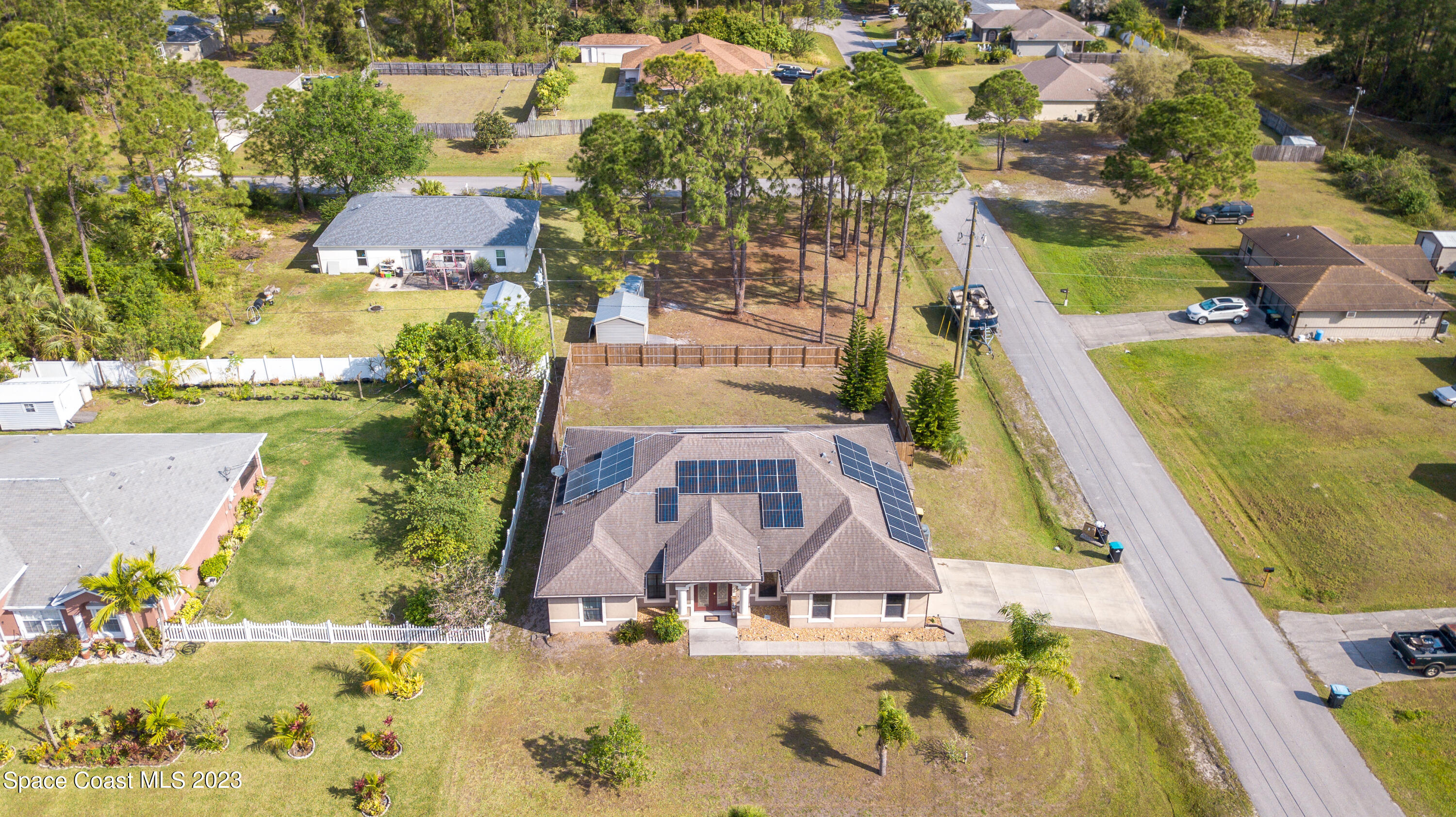 1201 Daton Road Southwest Palm Bay, FL 32908 - Photo 41 of 46 an aerial view of residential houses with outdoor space