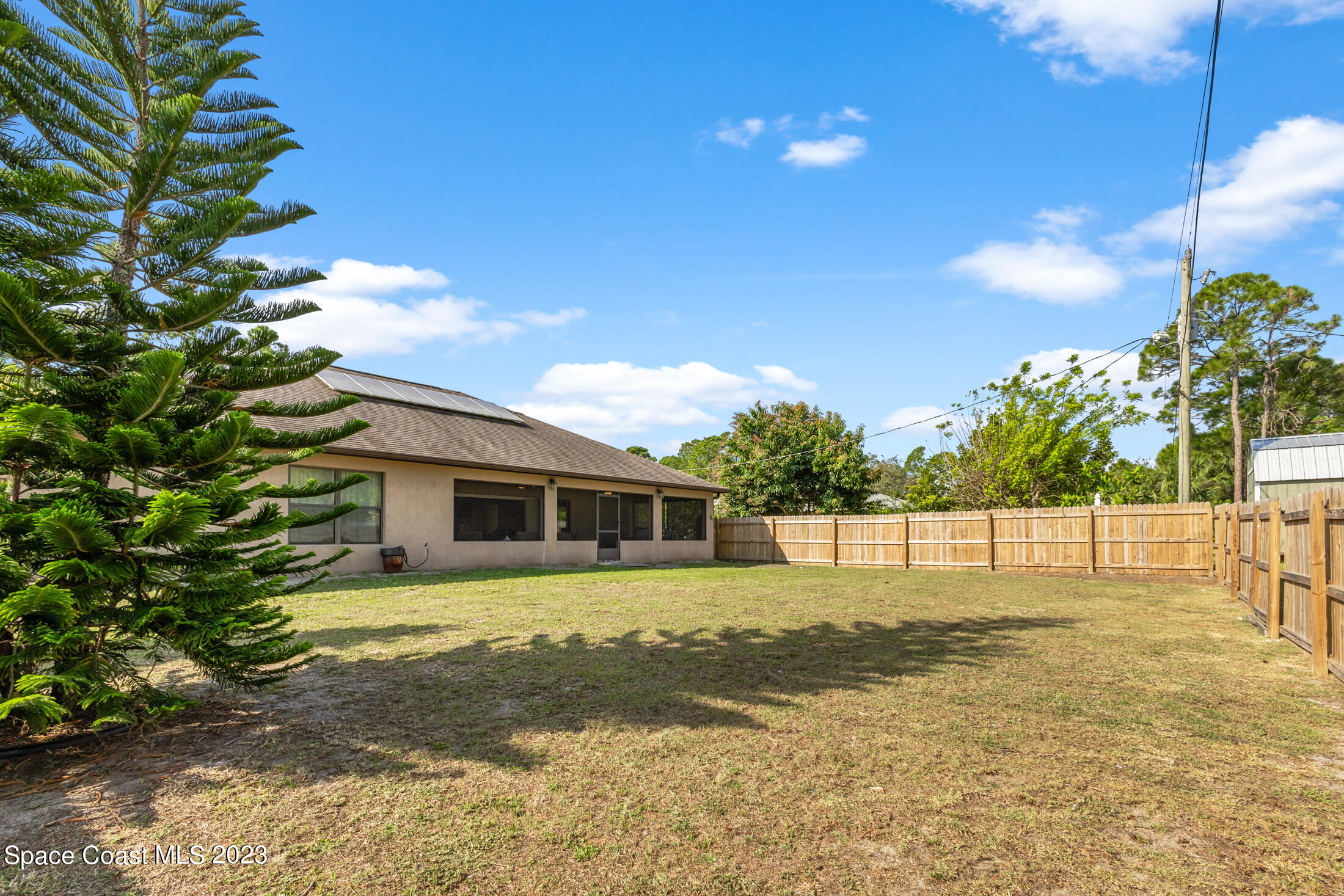 1201 Daton Road Southwest Palm Bay, FL 32908 - Photo 8 of 46 a view of a house with a yard