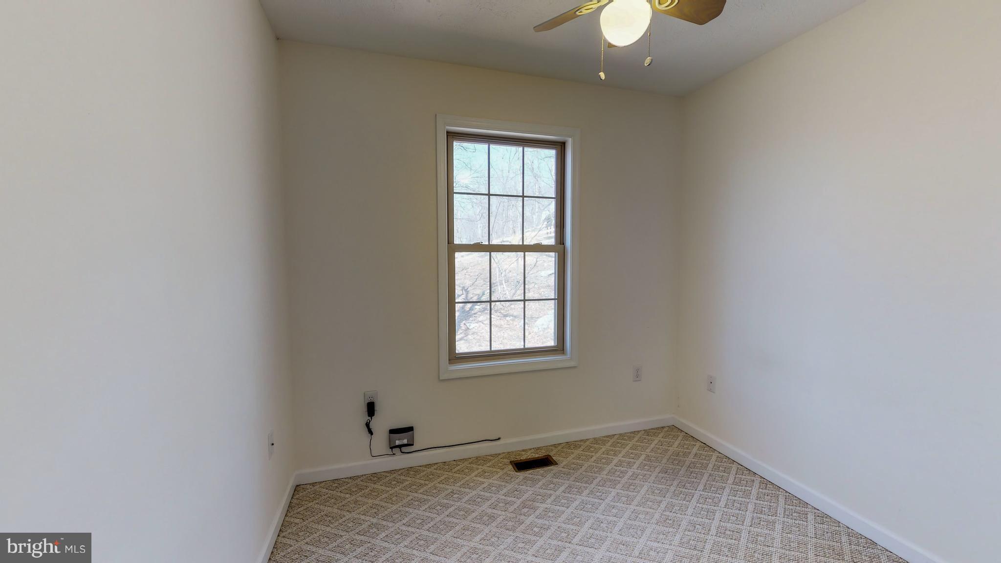 91 Mountain Top Road Front Royal, VA 22630 - Photo 15 of 35 Main level bedroom