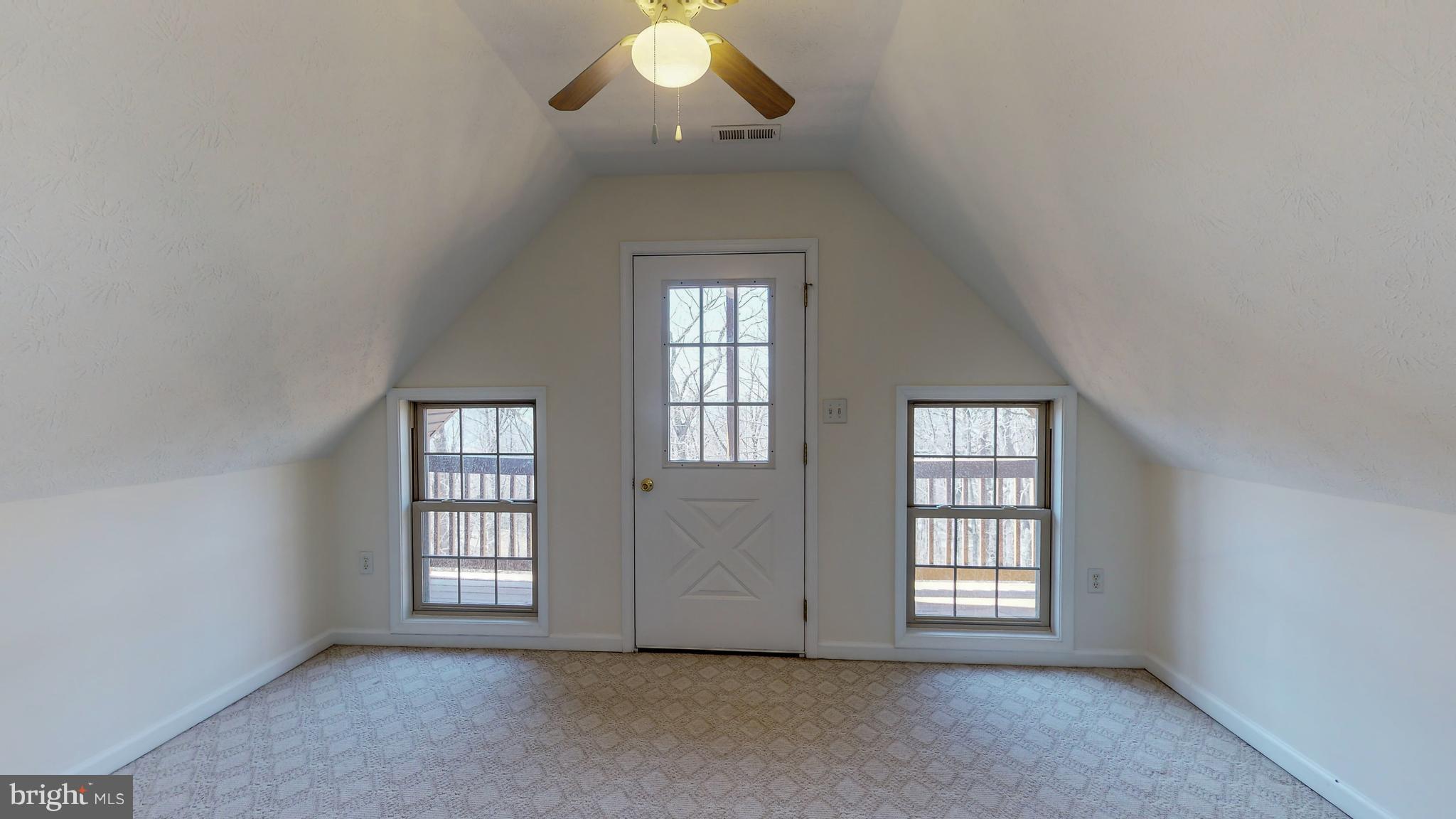 91 Mountain Top Road Front Royal, VA 22630 - Photo 21 of 35 Bedroom 3 upper level with access to balcony