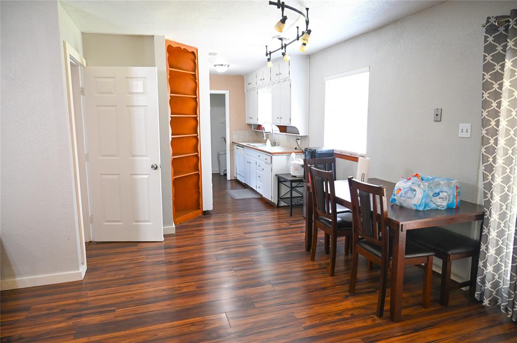 1352 Simpson Drive Hurst, TX 76053 - Photo 22 of 40 Wood-finish flooring extending throughout the space