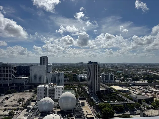 a view of city from terrace with seating space