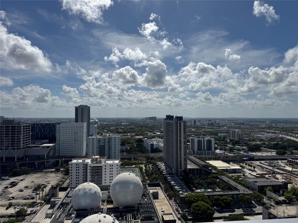 851 Northeast 1st Avenue, Unit 2606 Miami, FL 33132 - Photo 12 of 30 a view of city from terrace with seating space