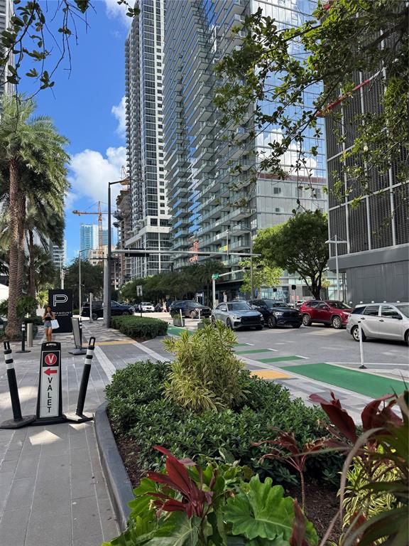 851 Northeast 1st Avenue, Unit 2606 Miami, FL 33132 - Photo 29 of 30 a view of a street with cars parked