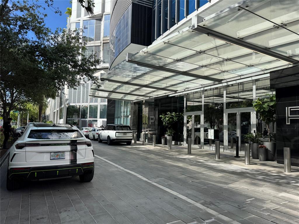 851 Northeast 1st Avenue, Unit 2606 Miami, FL 33132 - Photo 30 of 30 a view of a cars park in front of building