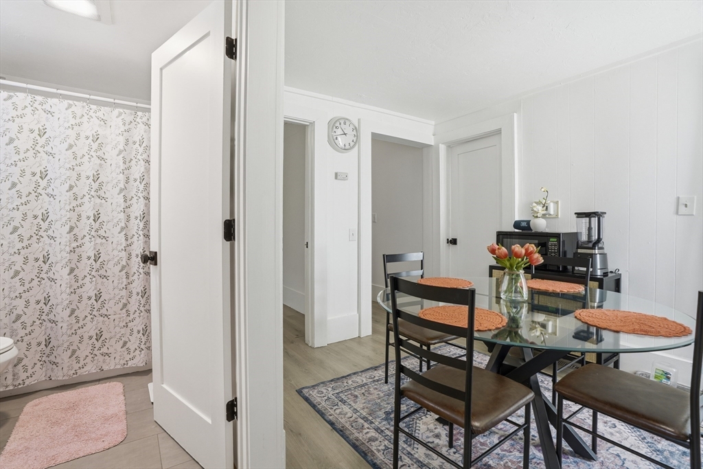 43 Wamesit Street Lowell, MA 01852 - Photo 17 of 34 a view of a dining room with furniture