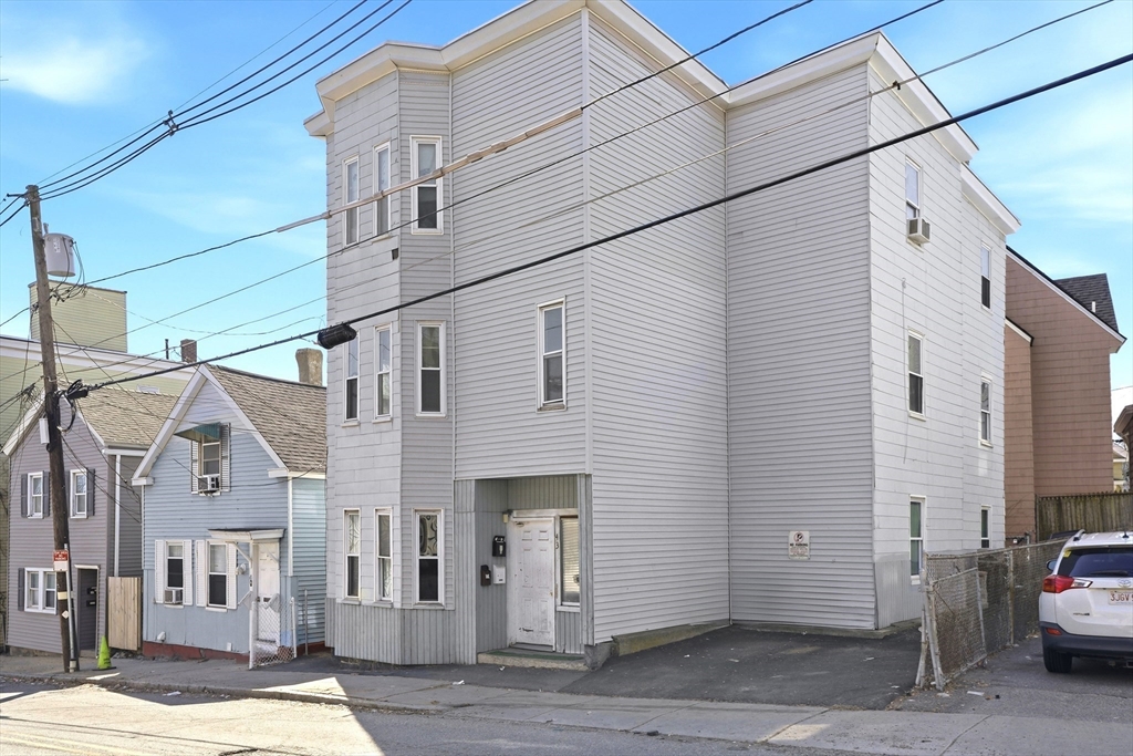 43 Wamesit Street Lowell, MA 01852 - Photo 2 of 34 a view of a street with of a house