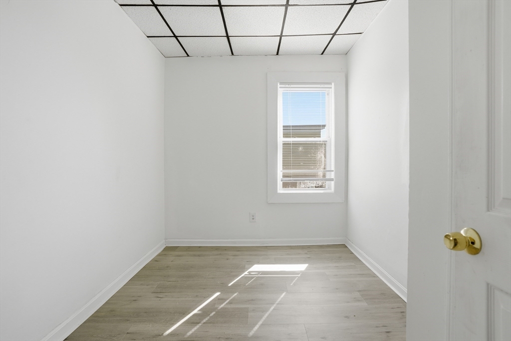 43 Wamesit Street Lowell, MA 01852 - Photo 24 of 34 a view of a livingroom with a window