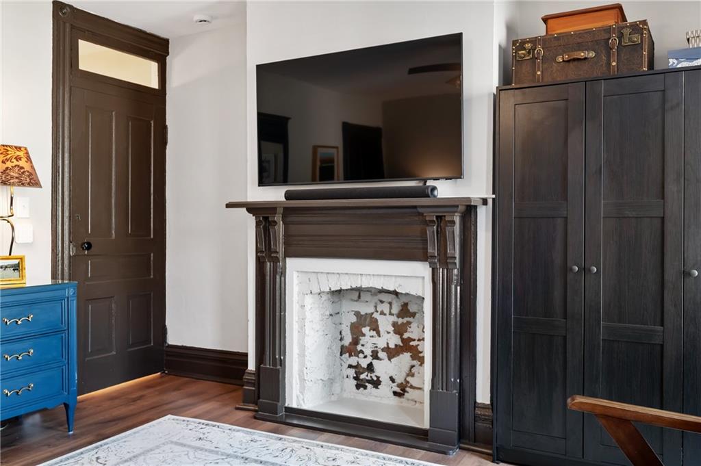 255 Edmond Street Pittsburgh, PA 15224 - Photo 24 of 50 a view of fireplace with wooden floor