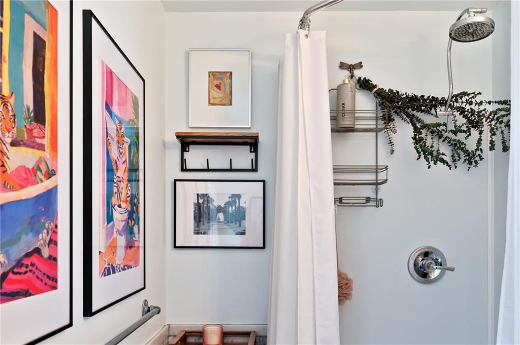 255 Edmond Street Pittsburgh, PA 15224 - Photo 40 of 50 a view of a hallway with paintings on the wall
