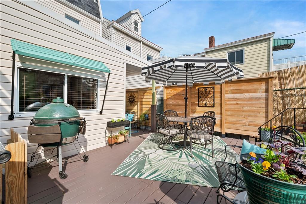 255 Edmond Street Pittsburgh, PA 15224 - Photo 44 of 50 a view of a patio with couches chairs and potted plants