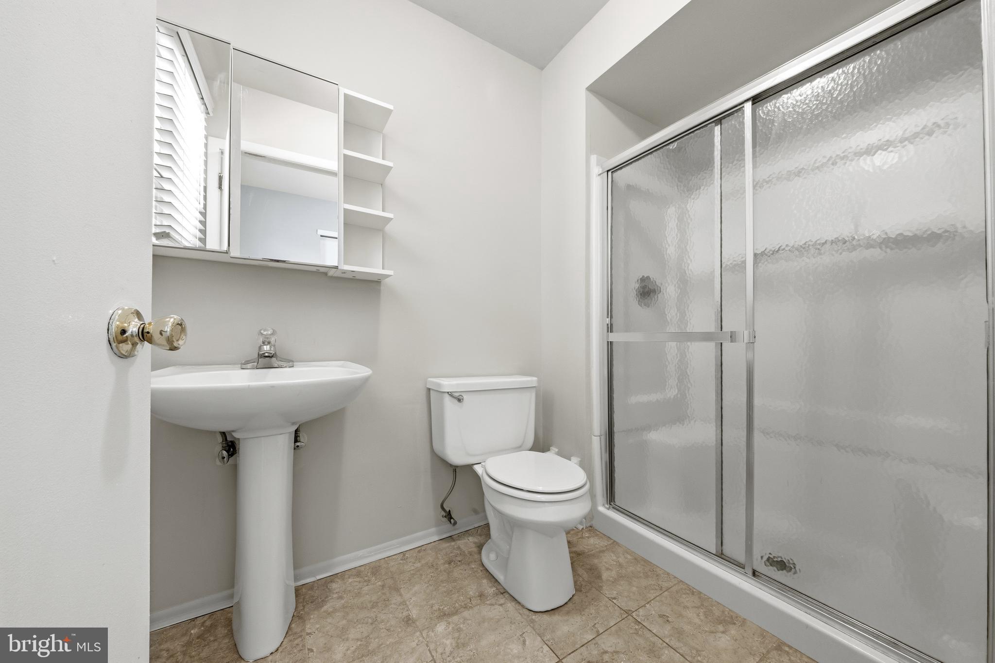 202 Shady Lane Marlton, NJ 08053 - Photo 17 of 38 a bathroom with a sink toilet and shower