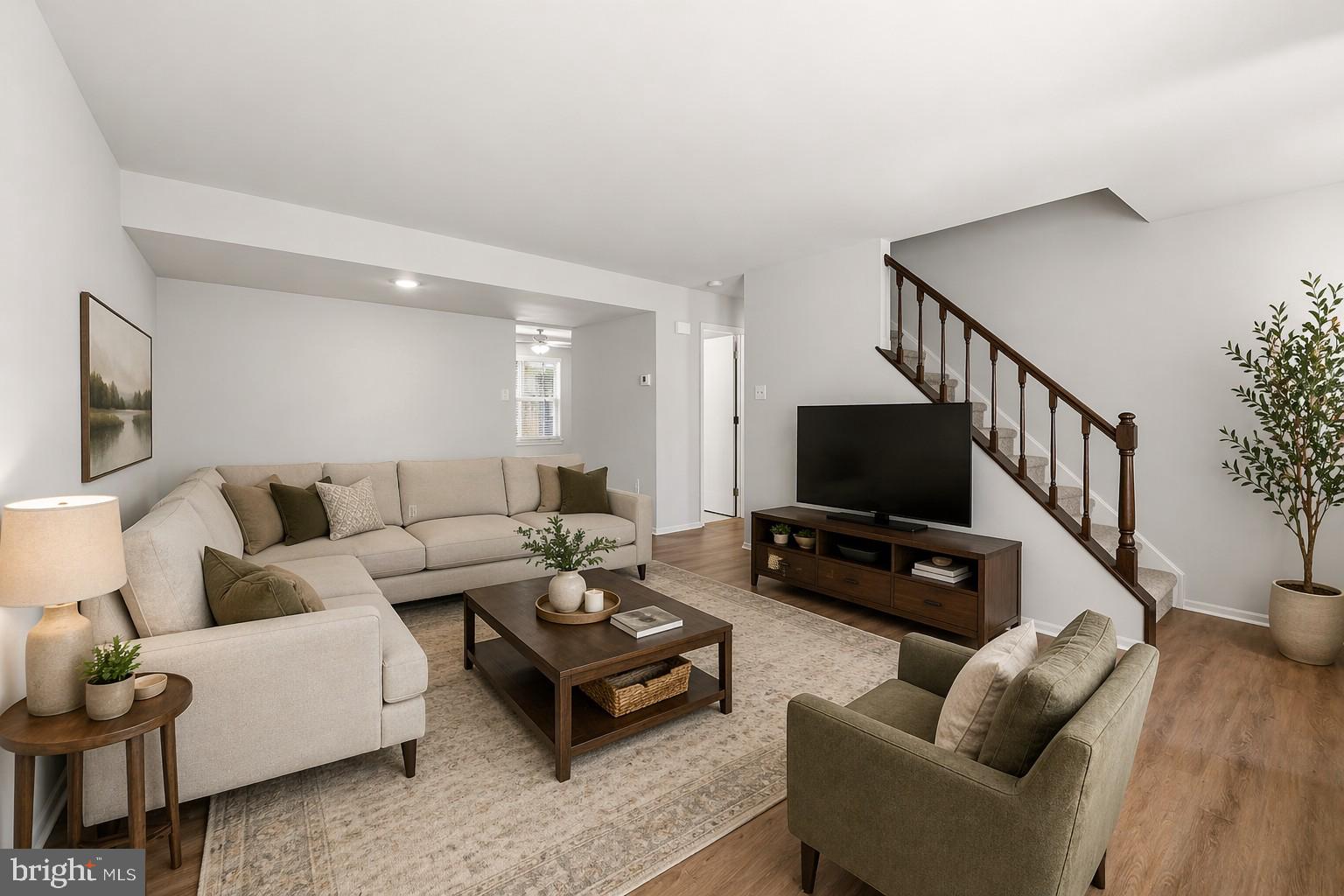 202 Shady Lane Marlton, NJ 08053 - Photo 2 of 38 a living room with furniture and a flat screen tv
