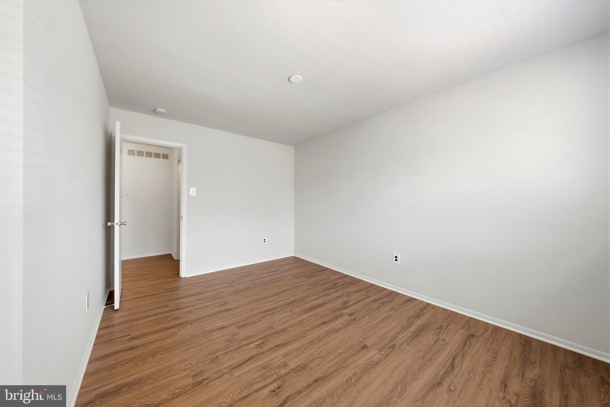 202 Shady Lane Marlton, NJ 08053 - Photo 25 of 38 a view of an empty room with wooden floor