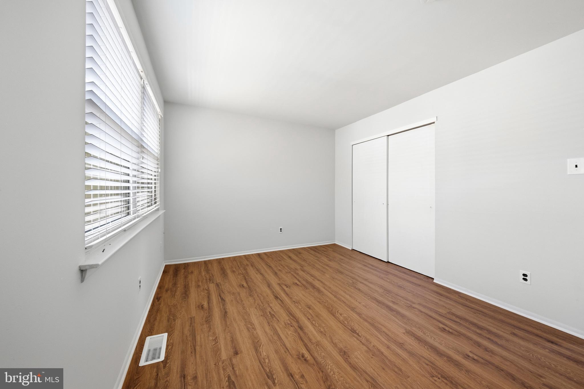 202 Shady Lane Marlton, NJ 08053 - Photo 29 of 38 a view of empty room with wooden floor and fan