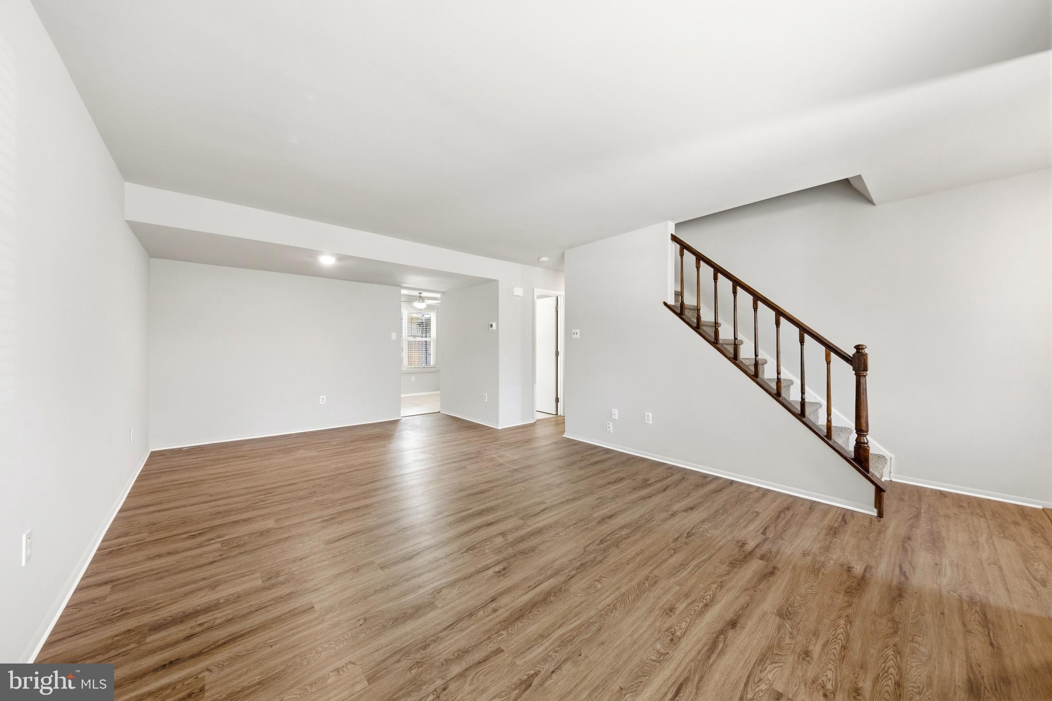 202 Shady Lane Marlton, NJ 08053 - Photo 3 of 38 a view of a hallway with wooden floor