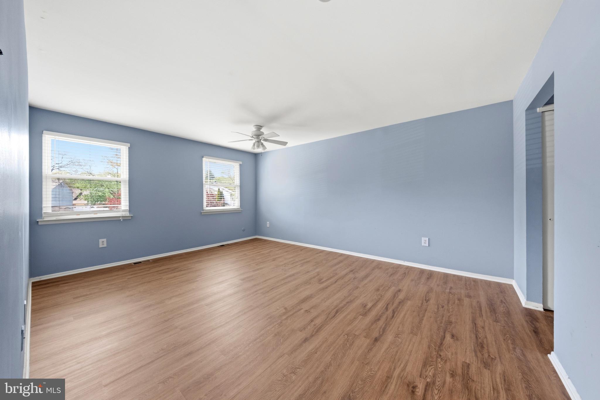 202 Shady Lane Marlton, NJ 08053 - Photo 32 of 38 an empty room with wooden floor and windows