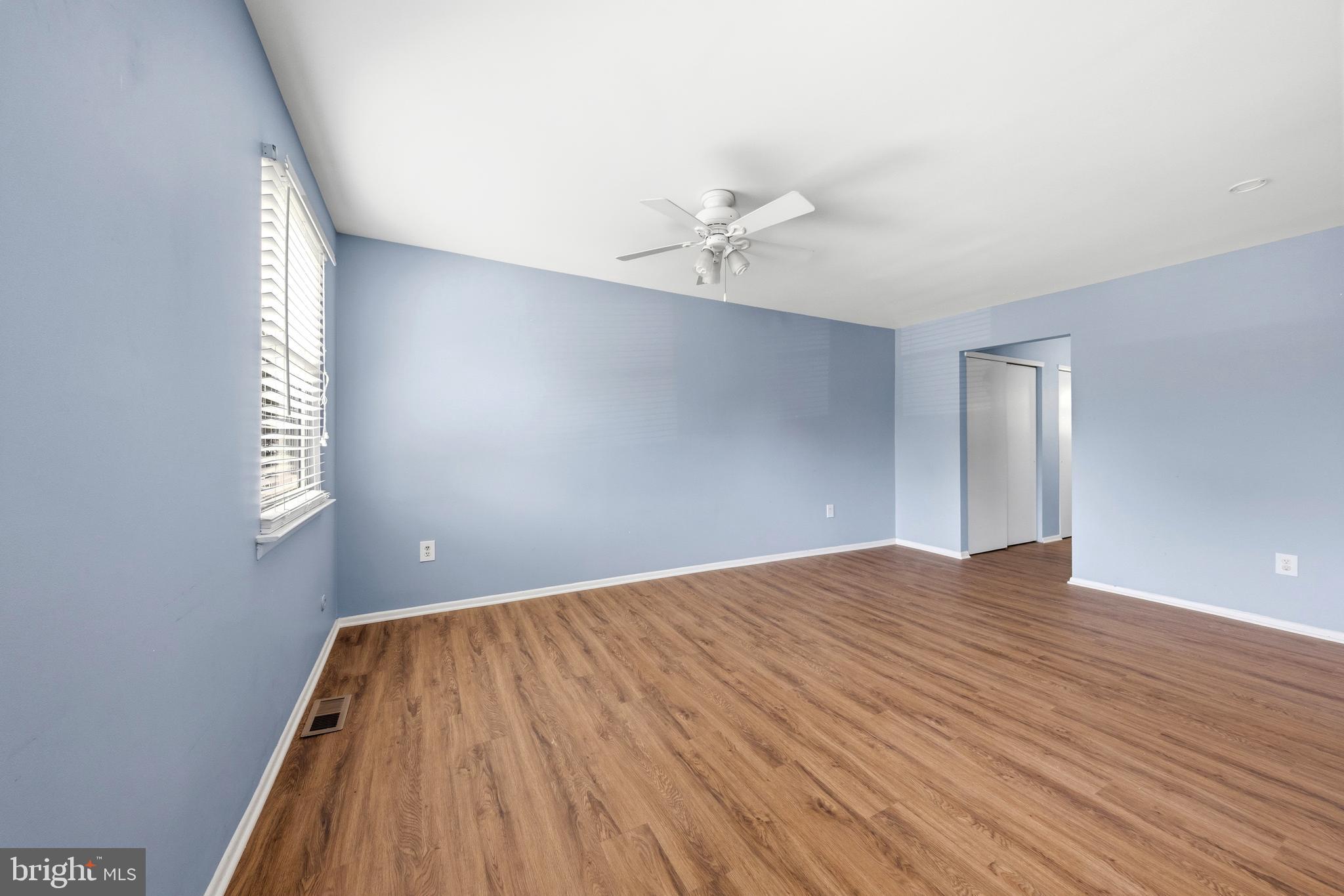 202 Shady Lane Marlton, NJ 08053 - Photo 33 of 38 a view of an empty room with wooden floor and a window