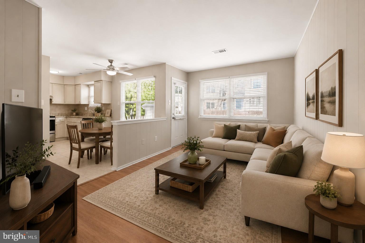 202 Shady Lane Marlton, NJ 08053 - Photo 10 of 38 a living room with furniture a flat screen tv and a large window