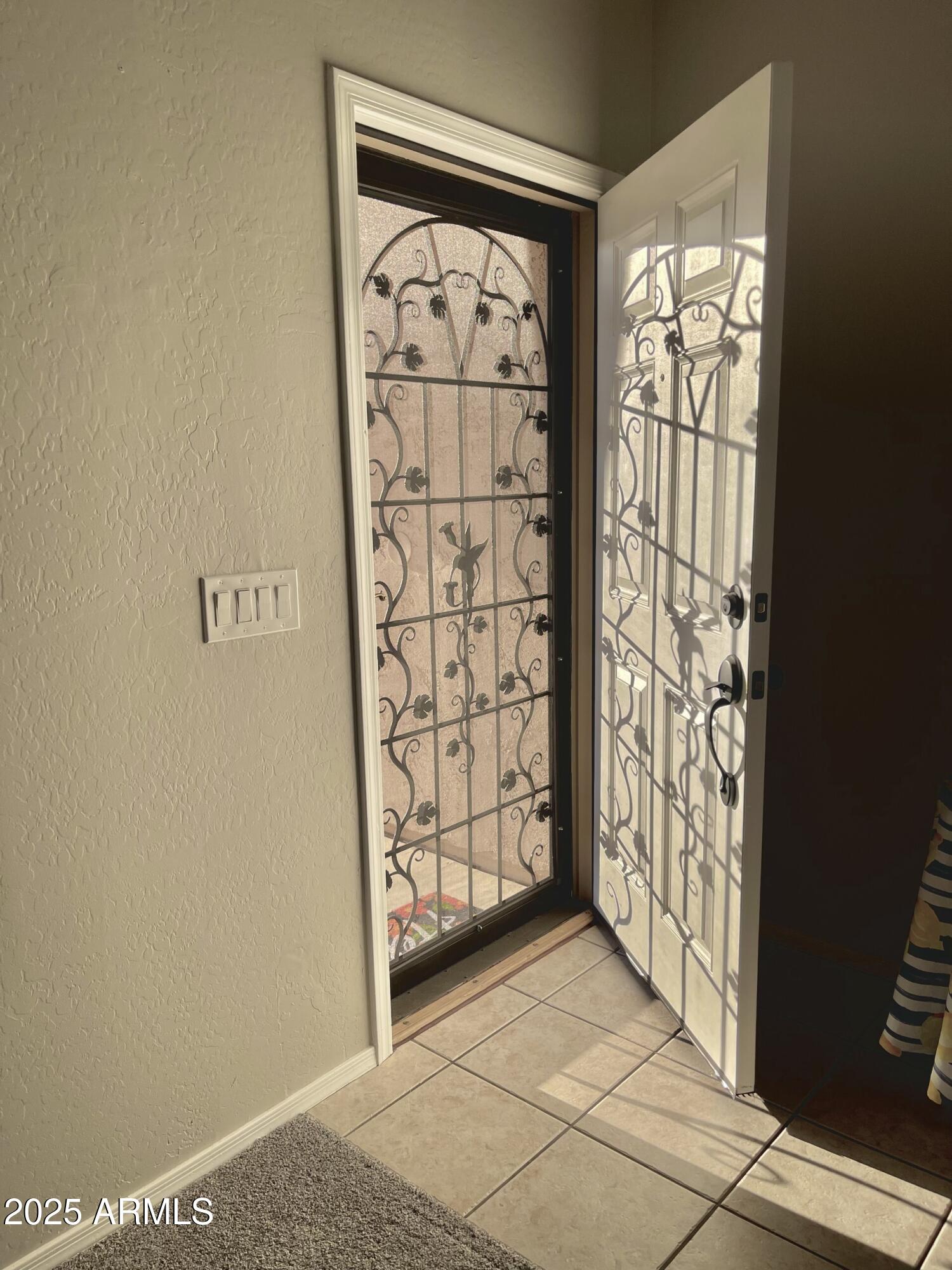 3613 North 127th Drive Avondale, AZ 85392 - Photo 2 of 12 a view of entryway with window