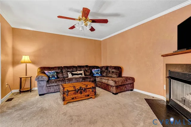 a view of walk in closet with clothes